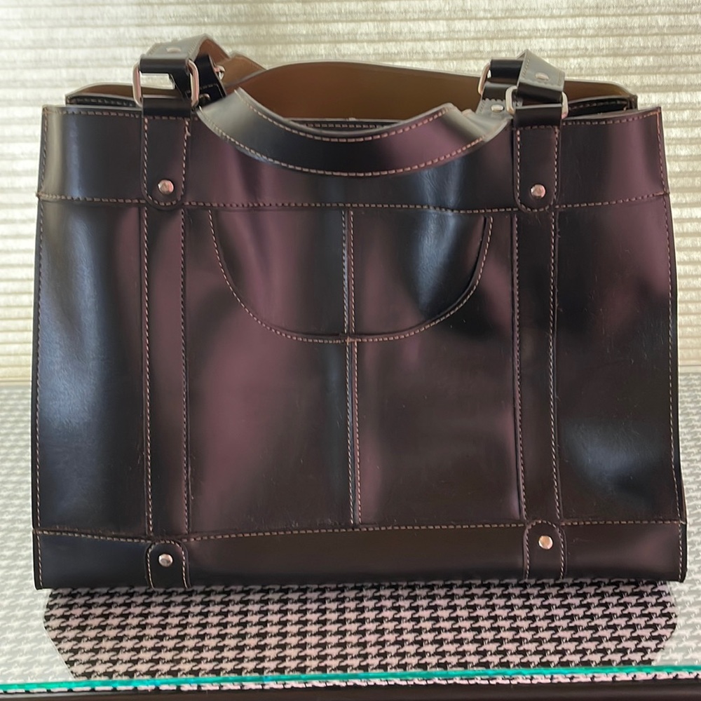 Emilie M bag. Great for travel or computer. Several compartments. Black leather